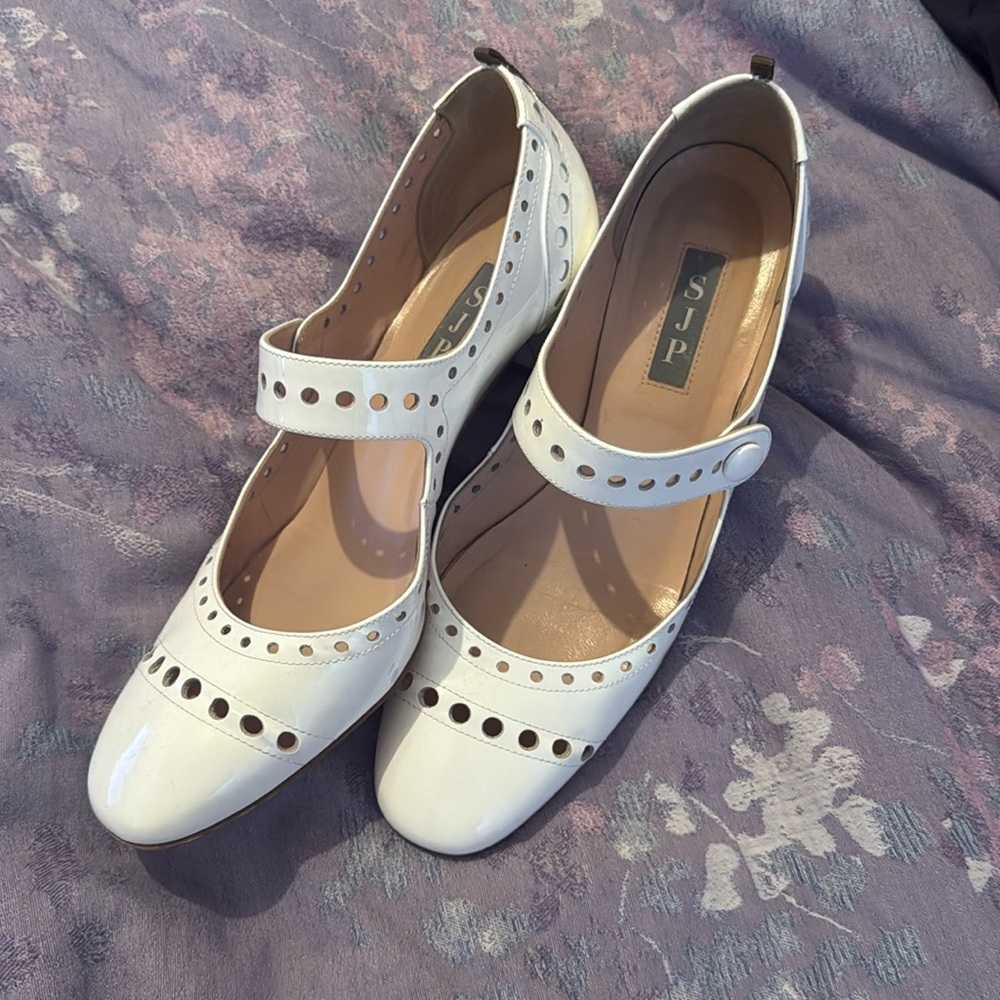 SJP White Patent Leather Mary Jane’s